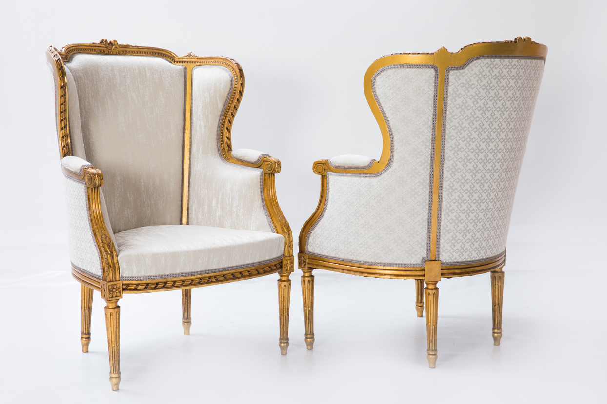 pair decorated armchairs