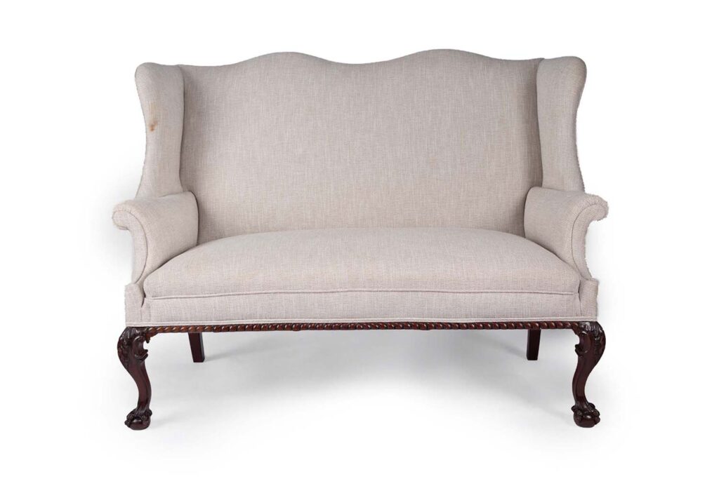 Decorating with Antique Furniture: Seeing the Potential in Period Pieces 13 Wallrocks have reimagined how this wing settee could look once restored and recovered.