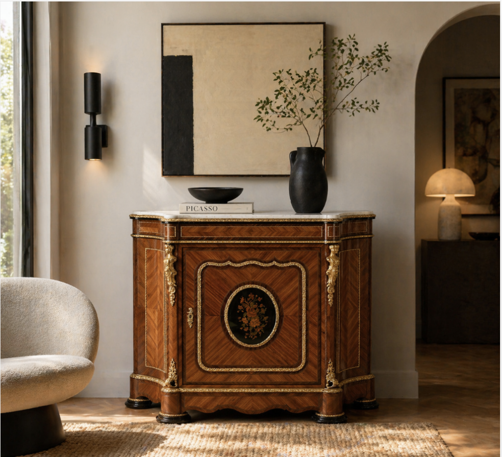 A large 19th century Louis XV antique sideboard sits beautifully in a contemporary room