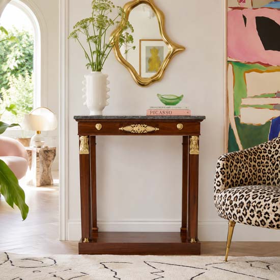 Styling 19th Century Antiques - A Question of Context: Eight Antiques, Many Rooms 29 An Empire console table in a playful interior